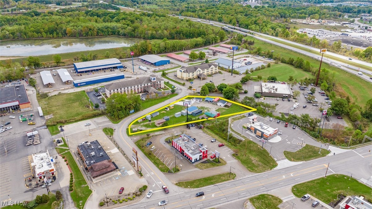 Outstanding commercial opportunity in a high-traffic location just off I-70 and minutes from the I-70/I-77 interchange. This cleared, level property offers exceptional visibility and accessibility with an average daily traffic count of 23,000 vehicles along Southgate Parkway. Situated between two busy restaurants and directly across from three national hotels, the location is ideal for a variety of commercial uses. The property is currently home to a successful metal building sales business that includes retail sales of vinyl decking and fencing, poly outdoor furniture, and deer blinds. A 10x20 Amish-built office building with electric, baseboard heat, and air conditioning is included with the sale. Whether you continue the current operation or develop your own commercial venture, this site offers excellent potential for retail, food service, lodging, or service-based businesses. Zoned commercial and ready to build, with all public utilities available at the street. *Prime commercial location*1.2± acre lot (cleared and level)*High visibility with 23,000+ daily traffic count*Easy access to I-70 and I-77
