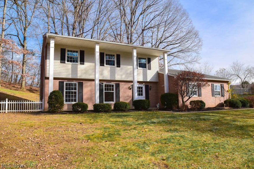 Gorgeous 4 bedroom, 2 1/2 bath colonial home. Kick off your shoes in your oversized foyer with a double closet, great for storing your winter coats without the clutter! This home flows perfectly with the living room opening up into the formal dining room. The kitchen has beautiful GE brushed stainless steel appliances including the refrigerator and dishwasher. Kitchen also overs a double wall oven and a Kenmore countertop stove top. Enjoy entertaining in your enclosed 3 season room that walks out from the dinette. Cozy up on those cold winter nights by the fire in your family room and enjoy the the views of your gorgeous wood beamed ceiling. The basement is unfinished but has plenty of space to finish and already has an updated full bath! The basement also has extra room for a work area or extra storage space. Come see all this home has to offer!