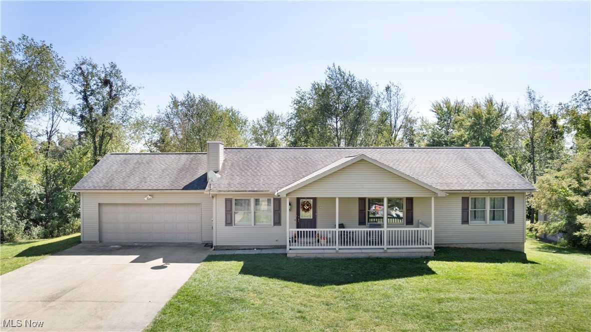 Welcome to this delightful ranch home, built in 2006 and nestled on a sprawling 3-acre lot in Weirton. Enjoy a well-designed layout that maximizes space and functionality offering modern single level living including main level laundry. The master bedroom offers an ensuite as well as a large walk in closet. The second bedroom boasts another walk in closet, while another bonus room can be used as a third bedroom with the addition of a closet or an office. The home boasts a full basement that presents a fantastic opportunity to be finished into a rec room or additional living space, allowing you to customize it to your needs. With a 2-car attached garage and a separate 1-car detached garage, you’ll have plenty of space for vehicles, storage, or a workshop. The expansive 3-acre lot provides ample room for outdoor activities, gardening, or simply enjoying nature. It’s perfect for those who appreciate a little extra space to roam. Situated in a quaint and friendly neighborhood, this home is just 30 minutes from Pittsburgh, making it ideal for commuters while still offering a peaceful suburban lifestyle. Plus, you'll be close to a variety of amenities, including shopping, dining, and recreational options. This charming ranch home in Weirton is a rare find, combining modern living with a serene setting. Don’t miss your chance to snag this wonderful opportunity for one level living in a convenient location!