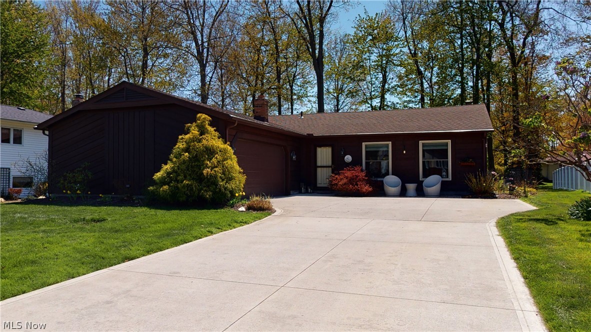 Welcome to one of Mentor's most beautiful and sought after neighborhoods! This lovingly cared for ranch style home sit on a quiet cul de sac and has so much to offer! Open floor plan includes a fireplace and gorgeous newer granite kitchen. Upgrades include lighting and wood flooring. Large master bedroom has a spacious walk in closet and roomy master bath that was upgraded in 2018. The other full bath was upgraded in 2019! New furnace (2020), A/C (2018), windows (2014) New dishwasher (2020), New driveway and garage door (2018) and the list goes on. Schedule your showing today.