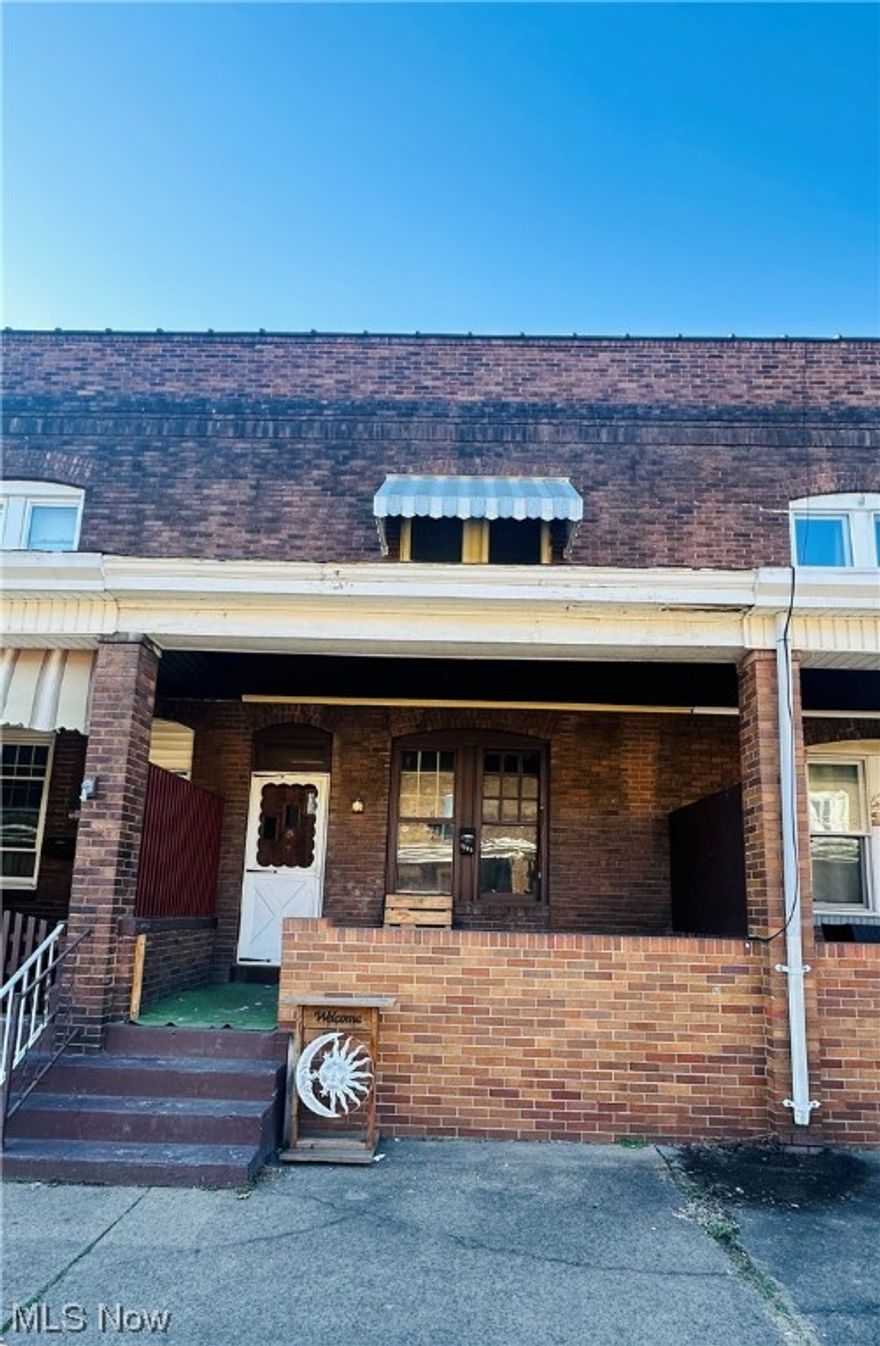 INVEST INTO YOUR FUTURE!  This 2 BR, 2 FULL BATH row house could be your added to your portfolio.  This unique unit has a detached garage, newly installed metal roof, and covered front porch.  This property is conveniently located within a few minutes from Route 7 and Toronto City School Complex.  Call today!