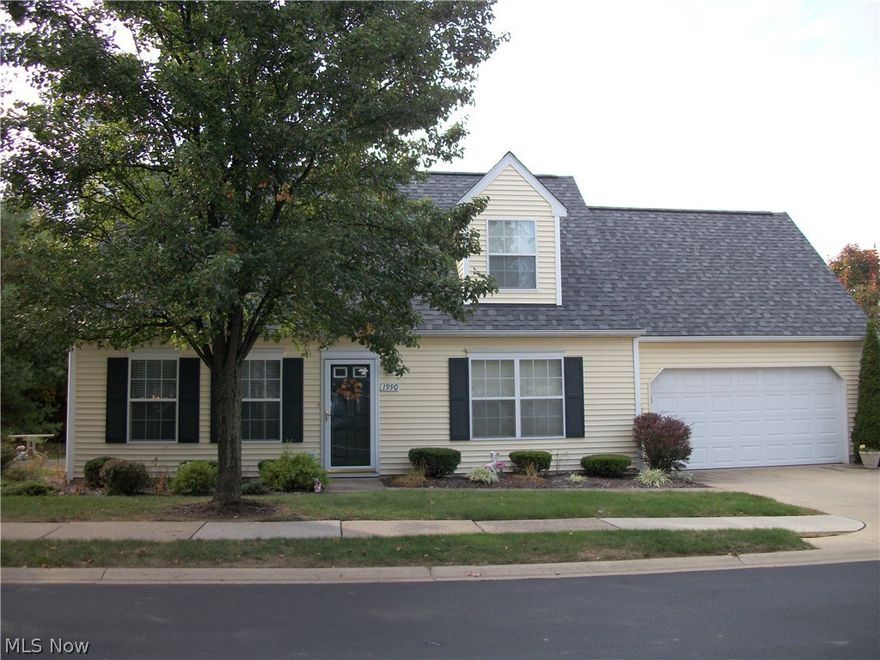 Carefree living at it's best in this desirable and versatile 2 plus loft or 3 bedroom condo plan. Enjoy step free living with a first floor bedroom, full bath and laundry, PLUS the additional 2nd bedroom, large loft/bedroom, full bath, and huge bonus room on the second floor. The 20'x12' bonus room is currently used as a walk-in attic storage area, but could easily be finished to your heart's desire. Great for entertaining or family enjoyment, the vaulted great room features a cozy gas fireplace and skylights, and is also open to the dining room. Sliders lead to your private patio for grilling and relaxing. The open kitchen with ceramic flooring is complete with breakfast bar, all appliances, abundant cabinetry, and pantry. The utility room and garage access are conveniently located off the kitchen. The 2 car garage with opener has water available for outside projects and provides for additional storage.  This bright end unit has a "free standing" feel with nice landscaping, side yards