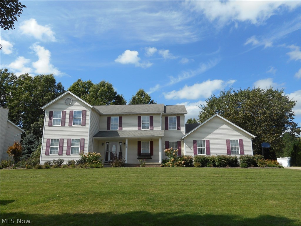 Looking for lots of space? This home offers 4 spacious bedrooms, 1st floor office and laundry, living and family room with gas fireplace and dining room! The spacious kitchen is equipped with newer stainless steel appliances, breakfast bar, large pantry, eating area and sliders to nice deck overlooking the flat, large backyard. The master bedroom suite is a great size with 7 x 10 walk in closet and full bath offering large vanity. The second floor is unique in the layout in which the master is on the opposite side of the staircase from the other 3 bedrooms offering lots of privacy. The basement is partially finished. Also enjoy the swing while reading your favorite book on your front porch.
Updates include: stainless steel appliances (11/16), new carpeting in bedrooms and office (7/18), hot water tank (2016); kitchen sliders (2017). Attached side entry garage and home warranty for peace of mind.
