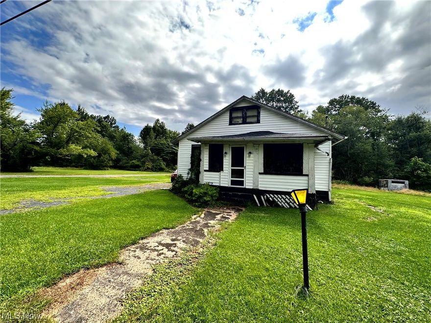 This fixer-upper home has potential and character. With some TLC, this can be transformed into a cozy home. This would be a great rental for an investor.
