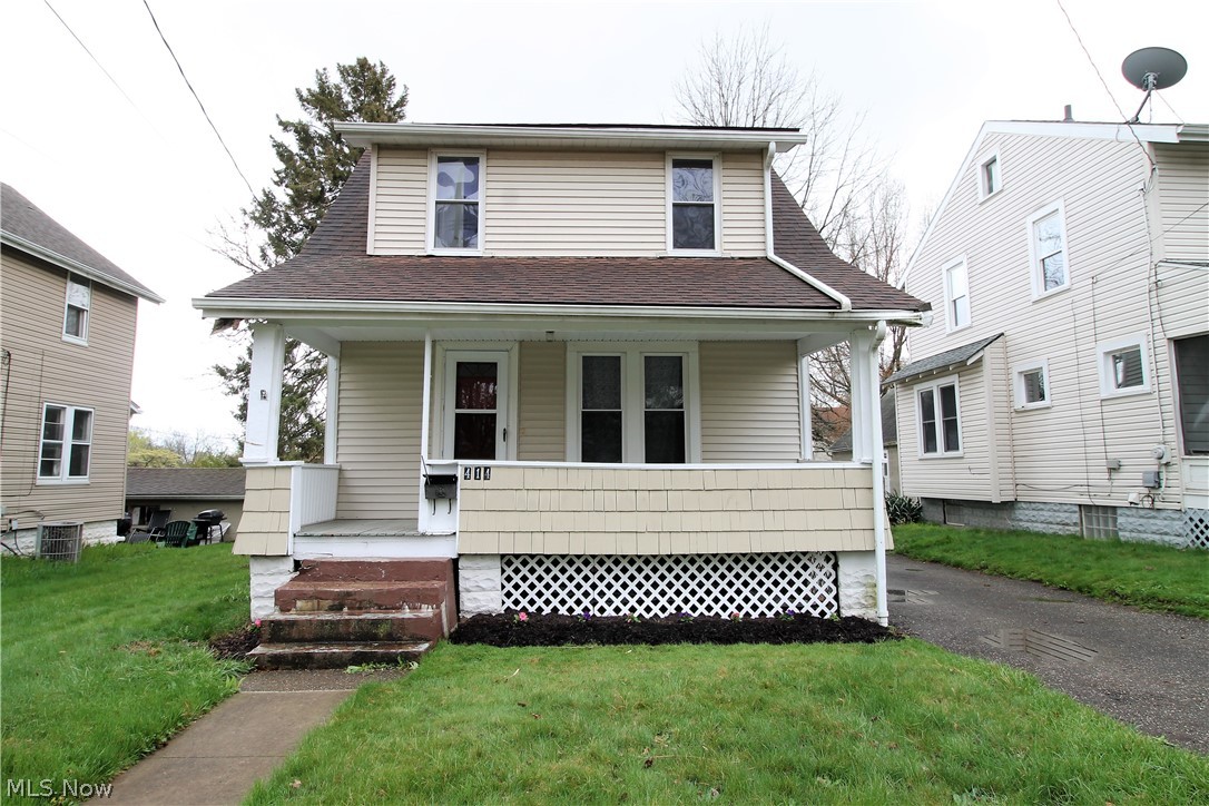 Welcome to this charming two bedroom colonial home that has an extra deep lot. Come on in from the front covered porch where you can sit out and enjoy, into the open floor concept to the large living room that has a large window to let the natural light to shine through and is open to kitchen, dining room that has all been recently painted and has modern lighting (2021). The dining room has a ceiling fan and is open to the kitchen, and has glass doors to the back deck which has a firepit. The lovely remodeled kitchen offers a bar countertop, plenty of cabinets, more windows for the sunshine to come through. Upstairs you will find two bedrooms, and a large full bathroom. There is a unfinished basement. One car detached garage. Precious memories begin right here!