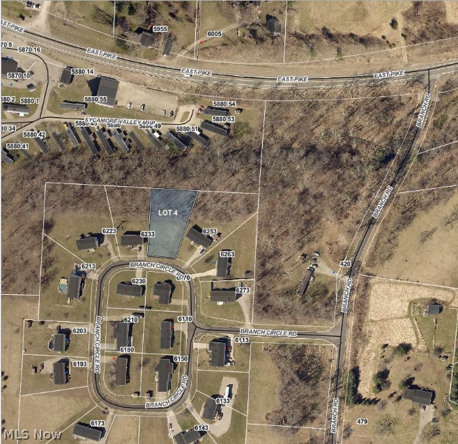 This conveniently located lot is ready for your new home. Public water and sewer are available in this small subdivision. Doublewide manufactured homes are allowed, but no singlewides. No HOA.