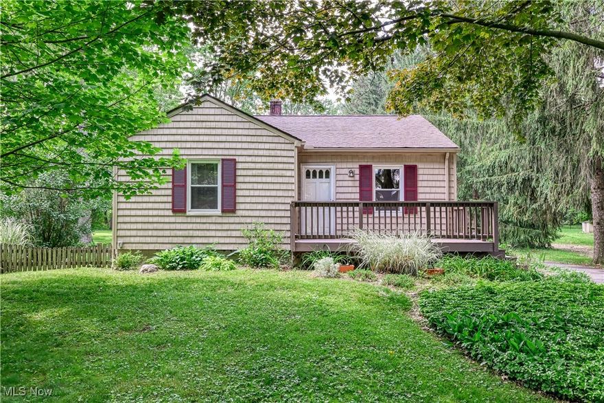 Fall in love as you pull down the long circular drive to your own oasis.  This 2 bedroom, 2 full bath Ranch sits on approx 1.55 acres and features a large covered back deck where you can relax and listen to your very own waterfall. First floor features a fully applianced kitchen, living room and main bedroom with hardwood floors.  2nd bedroom currently used as dining room with hardwood floors.  Full lower level with rec room, bonus room and 2nd full bathroom. Tinker on your next project in your 2 car heated garage. Driveway was paved approx 2 years ago.