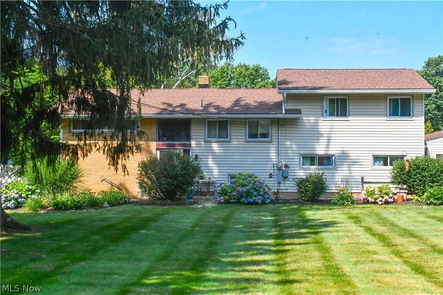 Welcome home to this 4 bedroom split level located in the heart of Wadsworth. Enjoy being in a neighborhood, close to parks, schools and all of the amenities Wadsworth has to offer, all while enjoying a very private fenced in back yard and above ground pool. A huge bonus with this house is that there is a 5th bedroom that you could use as an office, craft room or would be perfect for a nursery! This house has a great size yard and is all ready for you to plant your favorite fruits and vegetables in the garden! Make sure to schedule your showing because this home will not last long!