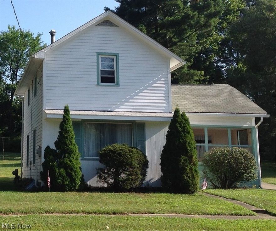 New furnace 2 1/2,yrs old.  Newer tilt in windows, New flooring in laundry room, sun room, and kitchen.  New roof on back part of house 7/2016.  Outside of house and garage newly painted. House being sold AS IS.  Driveway used to be an alley and is a shared driveway.