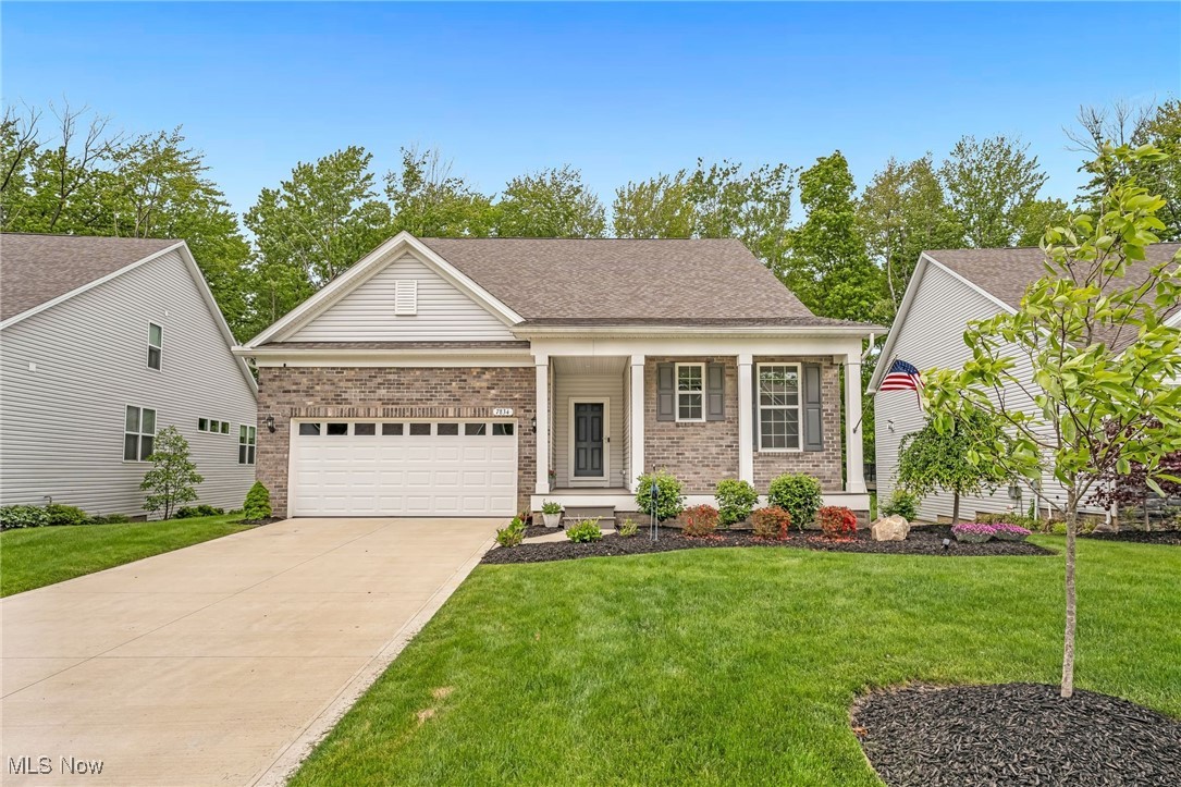 Welcome to this large custom built ranch home in the sought after golf community of Quail Hollow. Located on the 13th hole of the Weiskopf Course, this beautiful home features golf course, woodland, and water views with over 3600 SF of living space. Envision yourself greeting guests from your front porch and welcoming them inside. Once inside, the huge foyer, soaring ceilings, and unique layout are sure to impress. The home features five bedrooms, two are which are perfect for home offices, along with a lower level designed and built for entertaining or independent living. Take note of the ample storage throughout and special features such as a Pure Ozone Eco Laundry Washer System. The heart of the home is the open concept kitchen / living room / dining room which is ideal for entertaining or quiet nights at home, all overlooking your backyard. The gourmet kitchen features an oversized island, custom-built cabinetry, granite countertops, glass tile backsplash, pantry, upgraded appliances, and designer lighting. This great living space also features a gas fireplace and another covered porch, perfect for outdoor living in every season. The private master suite is located off of this great room, and features premium finishes in the bathroom, a double vanity, and a large walk-in closet. The lower level is where you will find the fantastic rec room with a second kitchen, living room, bar, bedroom, a full bathroom, and more storage. This flexible space features wonderful natural lighting with its massive windows – you and your guests will never want to leave. Home is available for purchase as is, or can be purchased fully furnished. Neutral decor in every room and lightly lived in - a true turn key property ready for immediate occupancy. Private Quail Hollow memberships packages available, providing access to the clubhouse, fitness center, swimming, social events, gourmet dining, and 36 holes of golf on the Devlin + Weiskopf courses. Schedule your showing today!