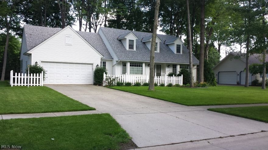 This lovely 4 bedroom-3 full baths Cape Cod home is located in one of the nicest neighborhoods in Elyria.  The home features beautiful hardwood floors, double paned Anderson windows and a recently replaced 50 year roof with gutter guards. The first floor master bedroom and laundry room offer living convenience.  The two large upstairs bedrooms each have 2 spacious closets and walk in attic storage.  A sun room and large (20 x 15) deck overlooks the private back yard featuring mature oak and maple trees that offer plenty of shade and a 10 x 14 storage shed.   The finished 2 car garage is deep enough for a full size truck and workbench. It also has ladder access to ample attic storage. The large, dry basement is unfinished with unlimited potential. It also has an additional enclosed 260 sq. ft. crawl space storage area.