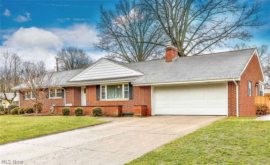 WOW!! BEAUTIFULLY RENOVATED THROUGHOUT! Replaced windows & doors, kitchen & baths, flooring, carpeting, lighting, appliances and so much more. Renovation included opening the kitchen to the dining area and large windows overlooking the private, fenced back yard. The gorgeous kitchen has white shaker cabinetry, granite counter tops w/subway tile back splash, rich wood toned flooring with wide plank hand scraped finish, stainless appliances and new recessed & pendant lighting. The front living room has a wood burning fireplace and huge windows for lots of natural light. The first floor family room has a brick accent wall and slider which opens to the patio and perfect back yard. The basement renovation includes a huge rec room with a second fireplace with a white shaker surround and is wired for your big screen tv above. New landscaping, gutters, closet organizers, Fairlawn gig...ask me for a list of updates because there are too many to mention!! This home is a must see!