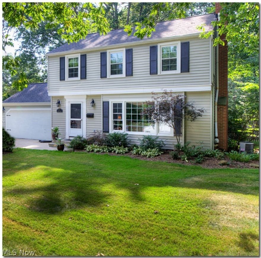 Appealing classic colonial on scenic lot. Redesigned eat-in kitchen with many customized storage options and pantry, all appliances stay. Spacious living room with fireplace. Formal dining area with newer custom french doors that lead out to your private  "haven" landscape design offers many opportunities  to entertain Family and Friends of  all ages.  The lower level has separate laundry area along with a Cozy family gathering space.  A/C 09, newer triple pain Glass windows, Newer Electrical  includes ceiling fixtures living room, bedrooms and kitchen. roof and gutters 2011. All of this in an amazing neighborhood.