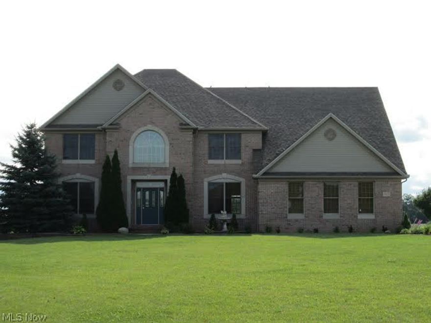 Buy an original Custom Built Colonial in beautiful Valley City! Large kitchen w/Corian counters & impressive detailed cabinetry provides plenty of working space & storage! Included w/all appls is a mini-fridge! The bayed area of the eat-in kit offers a stunning view of the sunrise! Great rm w/Palladian wdws offers another gorgeous view! Double-sided gas FP is also in the office w/custom built-ins! Spacious dining room has a tray ceiling & laminate flrs.  Other rms on the 1st flr: half bath, den & laundry rm. Adding a special touch is a custom built, winding staircase w/wrought iron spindles & copper accents! The staircase leads upstairs to 4 BRs w/walk-in closets. The luxury master is its own private retreat w/gas fireplace, 2 walk-in closets & sitting area! Glamour BA w/heated flrs boasts double sinks, sit-down vanity area, garden tub, separate shower & an abundance of cabinets! Bring your imagination to the full bsmt plumbed for a bath. Other features of this home include a Geotherma