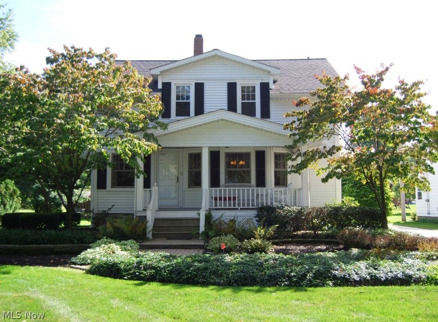 "Cute little house by the lake" located on over an half acre lot has a great front porch to relax on those crazy summer nights.  You can see the pride of ownership throughout.  The addition of a huge vaulted family room brings added space for everyday living and entertaining.  The character in this home is off the charts with hardwood floors in all the bedrooms. little cut-in for storage, and a beautiful room window seat in the living room.  Great large yard and detached 2 car garage. When you step in this home you can feel the "homeyness"!