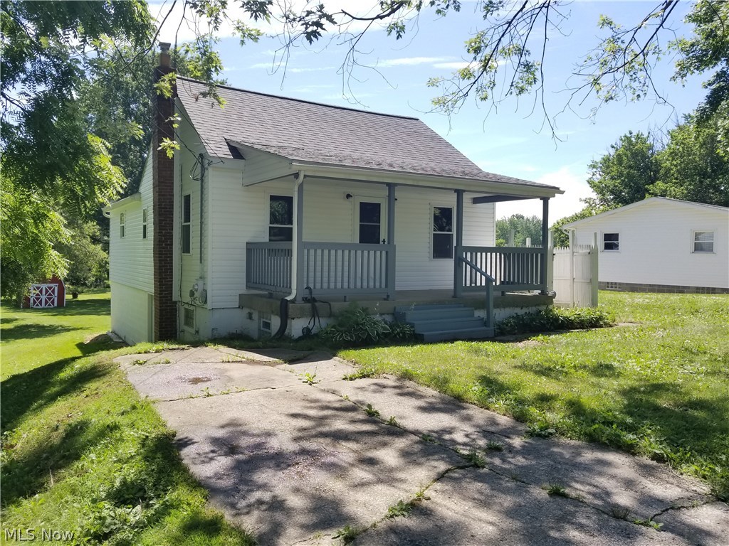 Country living in the city at it's finest! Perfect for a first time home buyer or an investment property! This newly remodeled 3 bedroom bungalow features brand new carpet, new kitchen flooring, and newer appliances! An abundant amount of storage space throughout. 2 spacious bedrooms on the first floor and a a bedroom on the second floor with a second room that can be made into a huge walk in closet! Partially finished basement with a media room added in 2014! Huge private backyard sits on almost an acre of land that has apple trees, blueberry and raspberry bushes! This absolutely charming home has it all!