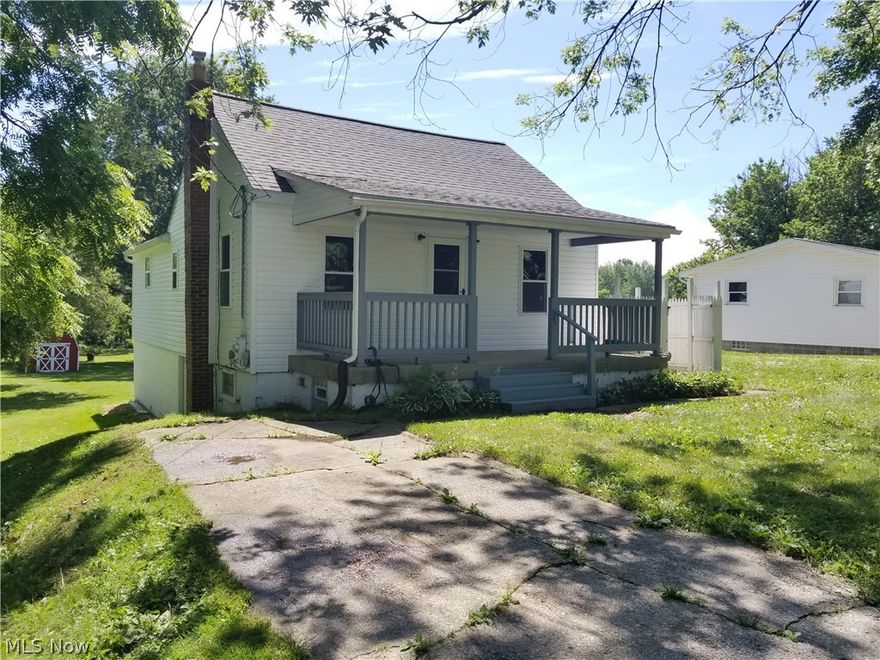 Country living in the city at it's finest! Perfect for a first time home buyer or an investment property! This newly remodeled 3 bedroom bungalow features brand new carpet, new kitchen flooring, and newer appliances! An abundant amount of storage space throughout. 2 spacious bedrooms on the first floor and a a bedroom on the second floor with a second room that can be made into a huge walk in closet! Partially finished basement with a media room added in 2014! Huge private backyard sits on almost an acre of land that has apple trees, blueberry and raspberry bushes! This absolutely charming home has it all!