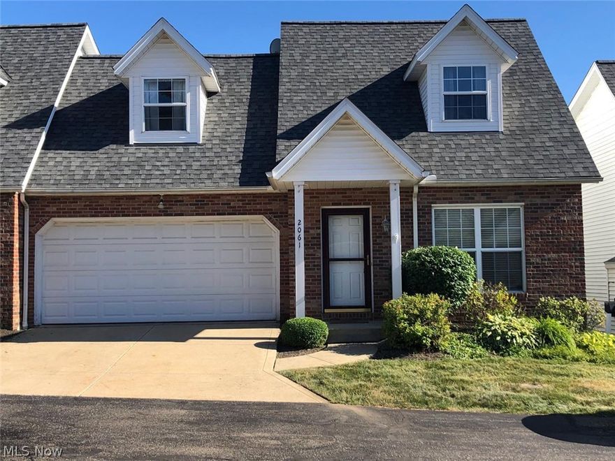 2061 Jennifer St Akron Ohio 44313 offers a rare opportunity for a rental in the highly sought after Sand Run Pointe. This condominium offers a 1st floor Bedroom retreat with an additional 2nd floor bedroom retreat and 2 additional bedrooms for a total of 4 bedrooms and 2 and a half bathrooms with a 2 car garage with extra storage space. The 1st floor also offers a large open living room & dining area all with LVT wood look flooring. Then it is on to the newly remodeled kitchen with white shaker cabinets, granite countertops, LVT flooring, Large island with breakfast bar and tons of storage, Stainless Steel sink with chrome faucet and knobs with a door to the backyard. 1st floor master bedroom has large walk in closet & separate linen closet and an en suite that was also just remodeled with new cabinets, granite countertop, new faucets, mirror and LVT flooring. The laundry room, 1/2 bath & utility room round out the first floor space. The whole house was just freshly painted & granite c