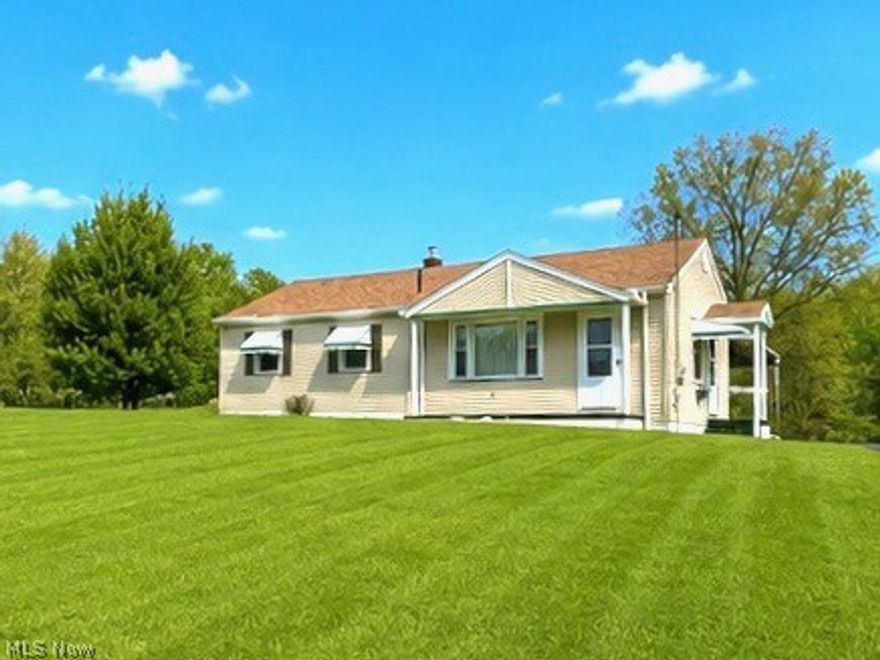 Take a closer look at this charming ranch-style home situated on a generous 0.60-acre lot in a quiet, peaceful setting. This well-maintained property features a spacious living room drenched in natural light, a galley kitchen complete with appliances, and a dedicated dining area—perfect for everyday living and entertaining. The main level also offers three comfortable bedrooms and a full bath. Hardwood floors are hidden beneath the carpet, ready to be revealed, and a central vacuum system adds everyday convenience and ease of maintenance throughout the house. The basement expands your living space with a rec room, kitchenette, laundry area with a washer & dryer, a second full bath, and storage space. Outside, enjoy the large yard with plenty of room to relax, garden or play, along with a covered area perfect for outdoor seating. A two-car detached garage and oversized driveway provide ample parking and storage. This is a solid, well-cared-for home offering great potential—ready for its next owner to add their personal touch.