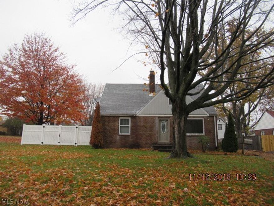 Come check out this three bedroom brick bungalow in a great Alliance location. Home offers a first floor bedroom and full bath as well as the convenience of an additional half bath on the second level with bedrooms #2 and #3. There is also a shower stall in the basement with lots of space that could easily be finished. Hardwood floors in many of the rooms and a fully enclosed brick breezeway with tile flooring and a fireplace all add to the appeal. Sold as-is. Buyer/buyers agent to verify all information herein.