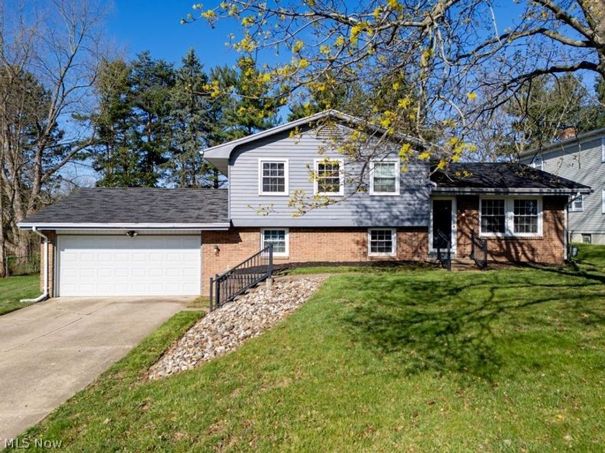 This beautiful home in the Lexington school district is ready for its next owners! 3 bedrooms, 2 full bathrooms. Featuring a functional layout with multiple living areas, spacious bedrooms, and natural light throughout. The kitchen flows directly into the living room for easy everyday living and entertaining. In the lower level, you will enjoy the large family room with a beautiful wood-burning fireplace. Also on this level of the home, you will find your laundry area and a second bathroom. In the rear of the home, you will find a concrete patio perfect for outdoor entertaining. Two car attached garage offers ample parking and storage space. Come check out this home today for your next home!