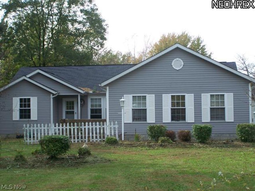 3 Bedroom Ranch. Handicap accessible doors and halls. L-shaped kitchen, dining and living areas all open to each other, great for large family gatherings. Front and rear decks. Over size attached 2 car garage PLUS 30x40 pole barn opens for semi  truck cap, or motor home storage. Private living on 1.7 acre, setting feels like much more. Sits back off road.