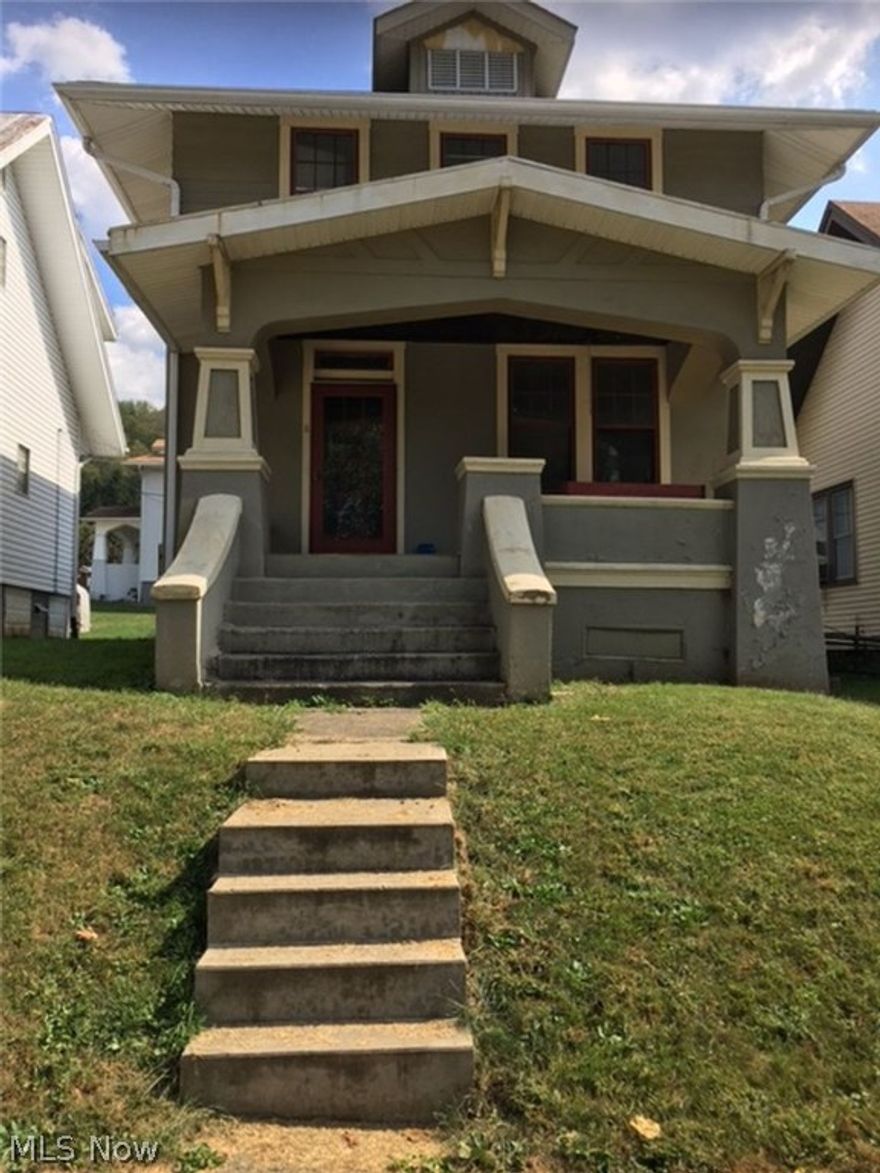 Beech Bottom- 2 story, 3 bedroom stucco home. Location is perfect though needs TLC. Perfect fixer upper or investment property.