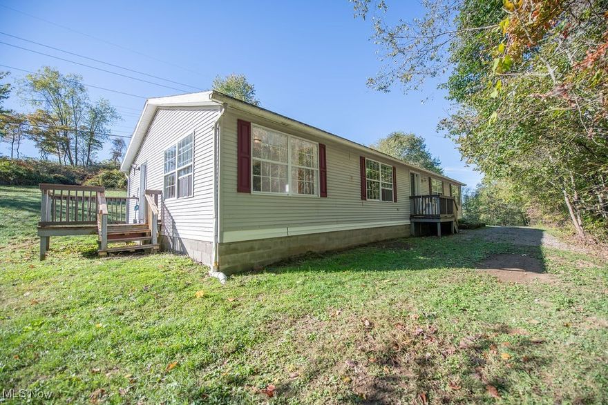 PEACEFUL LIVING just outside of town.  This spacious 5-bedroom, 2-bath modular is nestled on 1.45 acres in the highly desirable Indian Valley Local Schools.  Built in 2000, this 1,848 sq ft home offers a thoughtful layout, featuring an open floor plan, split-bedroom design, and plenty of natural light throughout. The generous kitchen and main living areas make entertaining a breeze, while the ample outdoor space allows for gardening, relaxing, or simply enjoying the serenity of country life. Updates fresh paint, new carpeting, new LVT flooring throughout, asphalt roofing and reliable mechanicals. This home is ready for you to move in.  This excellent location makes it easy with access to shopping and restaurants. Whether you're looking for a forever home or an investment opportunity, this property offers solid value in a sought-after school district.