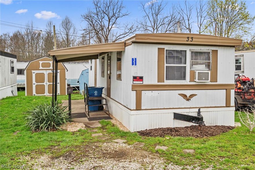 Completely refreshed and move in ready mobile home in Perry Township! This charming home has been thoughtfully updated throughout, offering a clean, modern feel with low maintenance living. Enjoy brand new carpeting, fresh paint, and updated window treatments that create a bright and inviting space.
The kitchen has been beautifully upgraded with refinished cabinets and countertops, a stylish new backsplash, and a brand new Frigidaire refrigerator. Additional improvements include all new light fixtures and new programmable electric wall mounted heaters for added comfort and efficiency.
The bathroom features a new vanity, sink, and backsplash, along with durable vinyl tile flooring. A new apartment sized washer and dryer add convenience to everyday living.
Outside, the home continues to impress with replaced skirting and freshly painted exterior trim, enhancing curb appeal. There is also a shed to offer extra storage.
Affordable, updated, and easy to maintain this is a great opportunity for comfortable living in Perry Township!