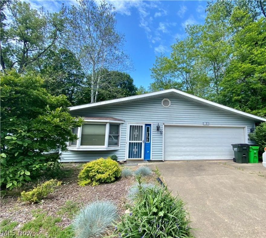 Spacious and affordable 2 bedroom ranch on double lot with city utilities.  Investors welcome!  The additional lot has 2 storage sheds.  Home needs some TLC.  Has newer furnace, newer dishwasher and range.  The small back yard is fenced.  Home sold as-is without repairs.