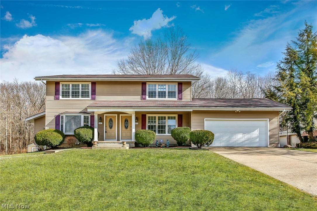 Desirable Multi family home in Stow! This property is owner occupied. Each side has 2 bedrooms and 1.5 baths. Each unit also has a 2 car attached garage. Many updates were done on unit 4101 in 2008. The eat in kitchen was updated. All the appliances will stay. You will enjoy the sunroom and the spacious deck. There is new carpet in unit 4097. The upstairs bath was updated and freshly painted. Both units have a partially finished basement. The property also backs up to a wooded area for privacy. The vinyl siding was updated in 2008 as well. The shed on the property stays.