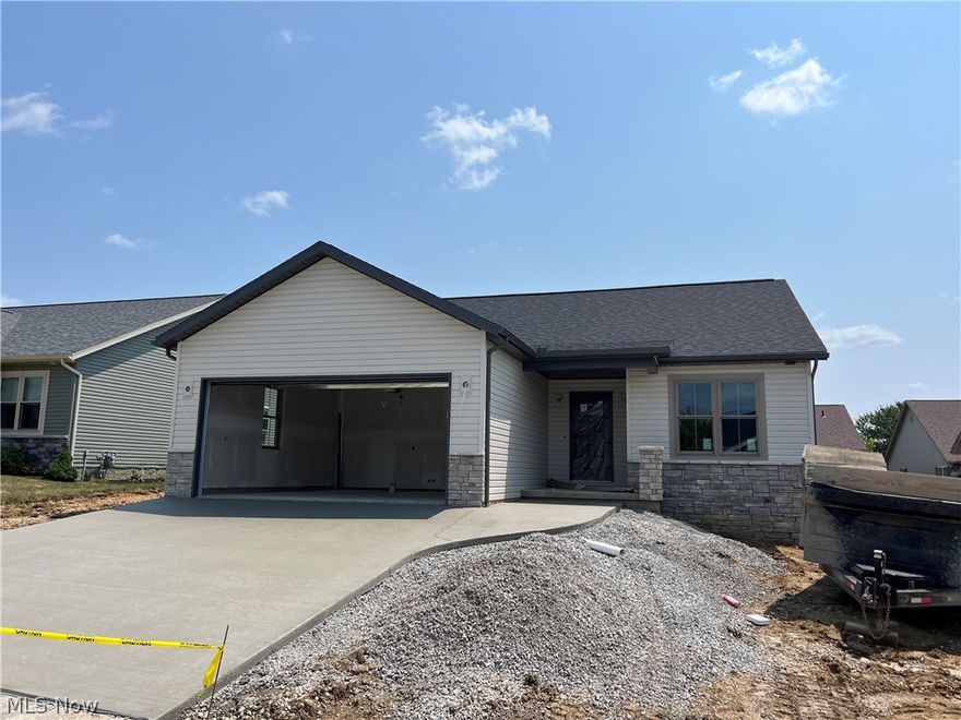 Brand new, quality built stand alone condo!  Spacious, open floor plan with island bar in the kitchen featuring Dutch Creek cabinets and Quartz counters.  Glass doors from the living room to the covered deck.  Main floor laundry room.  Walk in closet and full bath in the master suite.  Full basement with plumbing roughed in for an additional bath.  2 car attached garage.  Room sizes are estimates.  Taxes reflect the land only.  55 and older community.