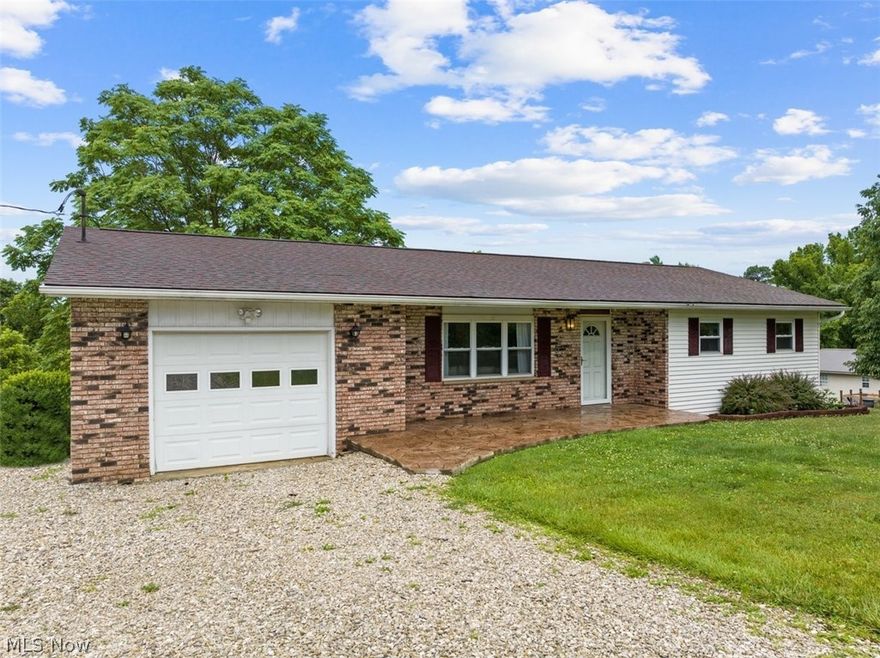 Check out this classic ranch-style home with 3-4 bedrooms, and 2 full bathrooms, & located in the Warren School District.  Situated on .73 acres, with a nice quiet setting located just 2 miles off the SR 339.  This home offers a spacious eat-in kitchen with access to back deck, and a one car attached garage. The full, walk-out lower level offers a huge rec room, large laundry room, a full bath, & 4th bedroom. New stamped patio, newer roof, new carpet, and fresh paint throughout, make this home easy to just move right in.