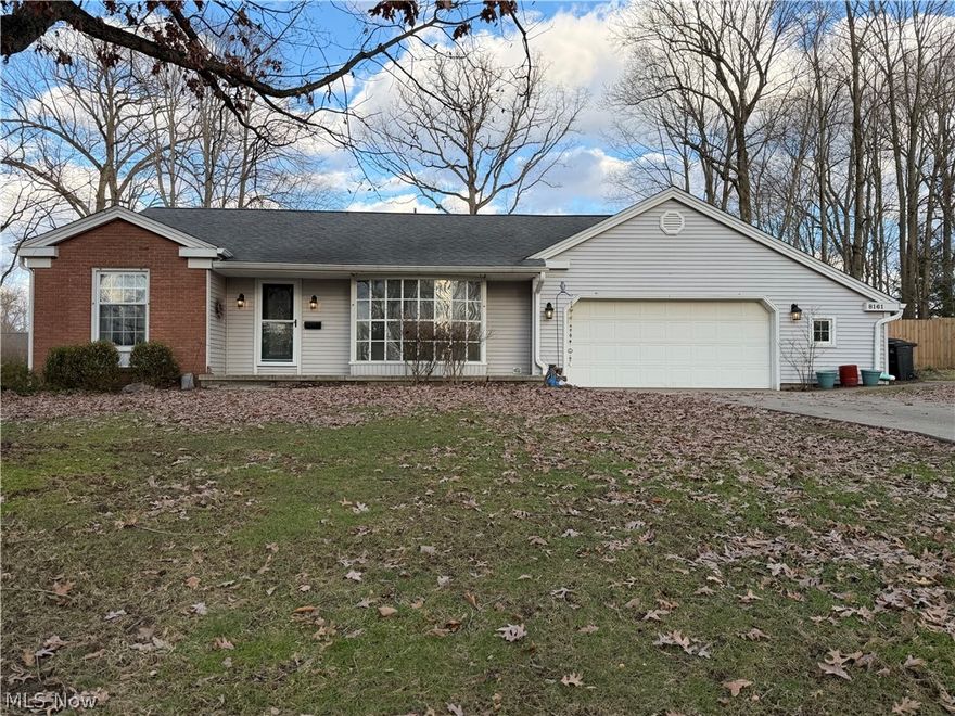 This well maintained 3 bedroom, 2 full bath, and 1 half bath home offers convenient first floor living in the HEART of Boardman! The spacious eat-in-kitchen features elegant quartz countertops and a cozy gas fireplace perfect for everyday living and entertaining. Enjoy year-round relaxation in the all season sunroom overlooking the private backyard with an in-ground heated pool. The large living room showcases a charming bay window that fills the space with natural light. The primary suite includes a walk-in closet and a private master bath with a walk-in shower. Two generously sized secondary bedrooms share another first floor bathroom with dual sinks and a tub/shower combination. The full basement provides even more living space with an office, recreation room, laundry area and ample storage. This home combines comfort, functionality and a fantastic location! Don't miss out on this opportunity to make this house your home!