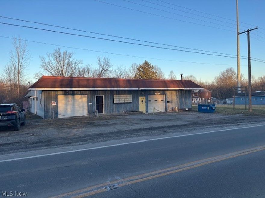 A rare find! Very large commercial building, over 4936 sq. ft., 5 lots included which stretches a block long. This commercial building was once used as a body/paint shop. The possibilities are endless for what you could use this building for! City sewer available at the street. 2 welders do NOT stay. Don't let this one pass you by. Can be shown on short notice.