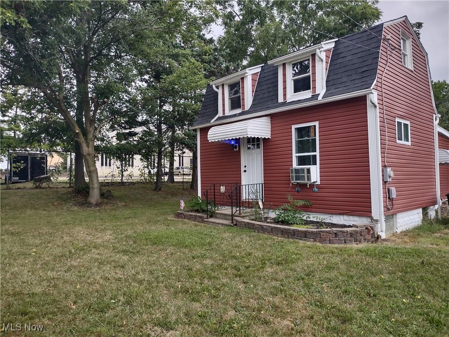 This quaint cape code on a large parcel (.91 acre) features an updated kitchen with stainless steel appliances, a private back deck, a storage shed, and plenty of land to construct a large garage and/or another home.  Other improvements include high-efficiency furnace, vinyl siding and shingles.