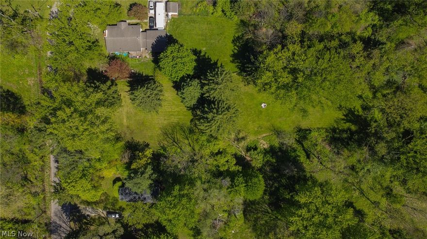 Beautiful piece of land located in W. Akron. Property is .84 of an acre and is ideal for those looking to build, property is well and septic.