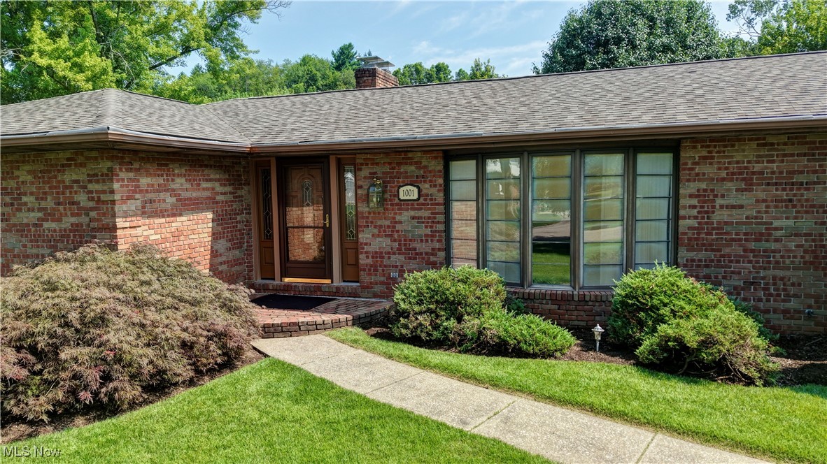 Quality-built brick ranch by Syl Hostetler, located in desirable Wilkshire Hills on a beautifully landscaped .52-acre cul-de-sac lot. This 3-bedroom, 2.5-bath home offers over 2,000 sq ft of main floor living with thoughtful details throughout. The spacious foyer opens to both a formal living room and a cozy family room featuring a stone gas fireplace and beamed ceiling. The large eat-in kitchen includes a built-in desk and pass-through to the formal dining room, ideal for entertaining. Primary bedroom measures 15x13 and includes a private bath. First-floor laundry with ample storage, two additional bedrooms, and a second full bath complete the main level. Additional features include pocket doors, bay windows, an oversized 2-car garage with water access, and a covered front porch? Perfect for relaxing evenings.