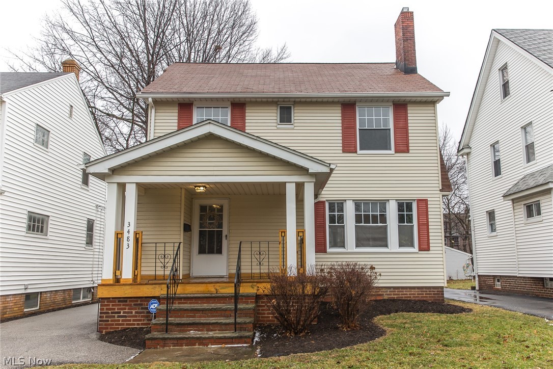 Welcome home! This beautiful 3 bedroom 1 & 1/2 bath colonial in University Heights is move-in ready and full of charm and character. Once you've entered from the adorable covered front porch you're greeted with stunning honey-hued hardwood floors that glow throughout the first and second floor. Enjoy all of the natural light In the living room from the giant picture window or a quiet night in front of the alluring wood burning fireplace. The formal dining room has two elegant built-in cabinets joined with a darling window seat. The completely updated kitchen is chic and classic with easy-care ceramic tile. Bright and cheerful upstairs includes 3 bedrooms and a full bath. Don't forget to check out the bonus room on the third floor which could be used as a fourth bedroom or a home office. The lower level has a finished recreation room great for entertaining or even a media room, 1/2 bath, and laundry. Don't miss your opportunity to view this stunning, well-maintained home!