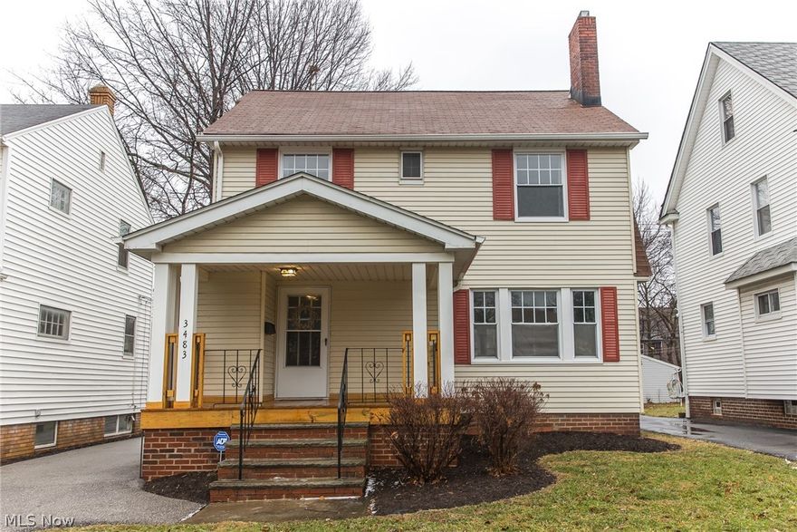 Welcome home! This beautiful 3 bedroom 1 & 1/2 bath colonial in University Heights is move-in ready and full of charm and character. Once you've entered from the adorable covered front porch you're greeted with stunning honey-hued hardwood floors that glow throughout the first and second floor. Enjoy all of the natural light In the living room from the giant picture window or a quiet night in front of the alluring wood burning fireplace. The formal dining room has two elegant built-in cabinets joined with a darling window seat.  The completely updated kitchen is chic and classic with easy-care ceramic tile. Bright and cheerful upstairs includes 3 bedrooms and a full bath. Don't forget to check out the bonus room on the third floor which could be used as a fourth bedroom or a home office. The lower level has a finished recreation room great for entertaining or even a media room, 1/2 bath, and laundry. Don't miss your opportunity to view this stunning, well-maintained home!
