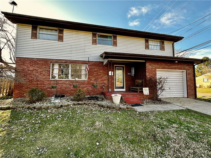 CORNER CUTIE ALERT!!!!! Check out this spacious 4 bedroom 2 1/2 bath Belpre home. This brick and vinyl sided beauty will have you counting down the days until you can splash around in the 6 ft in-ground pool. The backyard is the perfect outdoor entertainment spot with a stamped concrete patio, level lot, and the privacy of a fully fenced rear yard. The main level has an over-sized living room, formal dining room, large kitchen, and the convenience of a first-floor laundry center and guest bath. Head upstairs and you will be wowed by the flowing hardwood and custom built-ins for storage. The master suite has a generous layout, full bath, and is filled with natural light. Three more bedrooms complete the second level along with another full bath that is loaded with vanity space and offers nice neutral decor. The full basement supplies a great flex space for an added family room, game room, or man cave. Why settle? This space is so large you could have all three. Rounding out this home is an attached garage and an ideal location that offers easy access to restaurants, grocery, schools, medical facilities, and more. Grab this one up before somebody else does.
