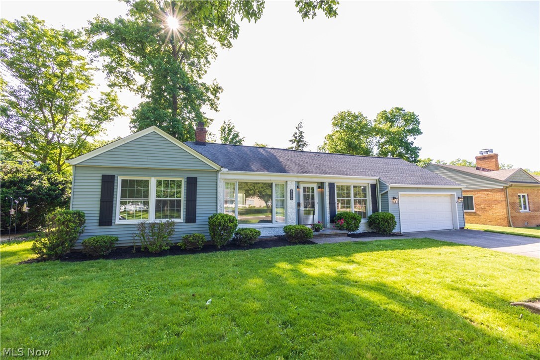 Feast your eyes on the most picturesque Fairview Park cape cod / ranch style home that delights both insides and out. This home could not be better located just steps from Bain Park, the middle and high schools and the Rocky River reservation. A gorgeous fenced in quarter acre lot in the shade of century old trees on a sidewalk lined street. Current owners have refreshed the home with new landscaping and all new paint job with inside and out. Step inside to a charming entryway with vertical shiplap detail. All new luxury vinyl plank flooring throughout the first floor living space provides a flow between rooms. Very spacious family room with giant picture window overlooking the front yard, wood burning fireplace, and built in shelving is a delight. A pair of French doors opens to vaulted bedroom also perfect for office, mudroom, playroom and more. Cozy dining area with built ins flanks the stylish kitchen highlighted by ceiling beams, quartz counters, designer backsplash, gold fixtur