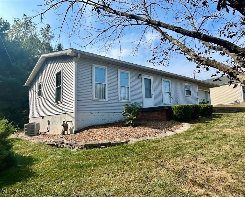 This charming single-story home offers over 1,100 sq. ft. of comfortable living space. Featuring three bedrooms, one bath, open floor plan with eat-in kitchen, lots of natural light and beautiful hardwood floors throughout most of the home. Perfect for easy living! The attached 24 X 10 garage has an additional 11 X 7 space for storage while the extra wooded side lot offers privacy and a touch of nature. The rear patio gives you access to the partially fenced private back yard that is landscaped and includes a pergola and storage shed. Located on a corner lot on Harmar hill--It's an inviting and cozy space, ready to be called "home".