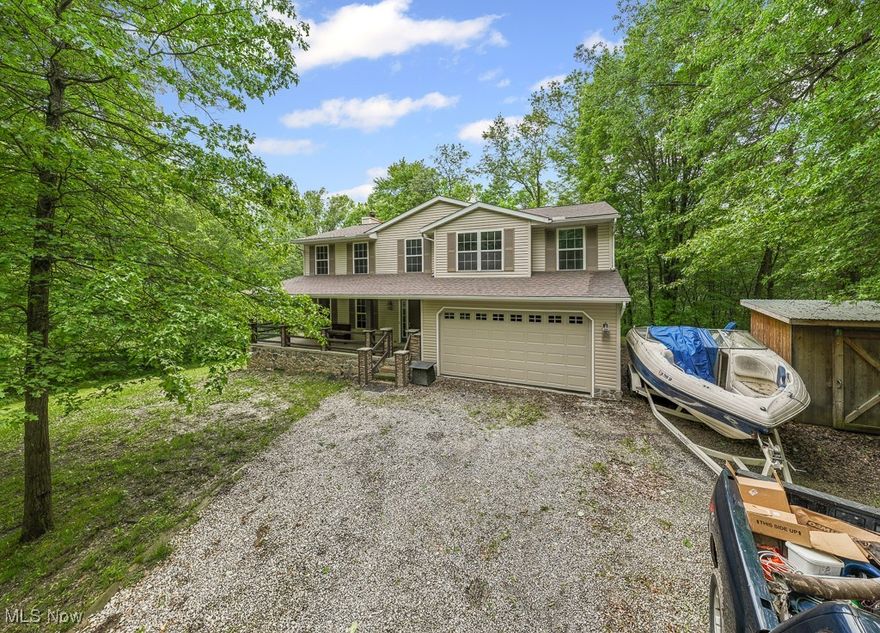 Welcome to this beautifully remodeled home, nestled on an expansive 18-acre property, offering serene country living with modern amenities! This stunning four-bedroom, two-and-a-half-bathroom home has been thoughtfully updated and is ready to welcome its new owners. As you make your way up the winding tree lined driveway you open up to the home. As you enter the first floor, you’ll find a spacious family room perfect for gatherings open concept updated kitchen featuring marble countertops, and a cozy den that offers flexibility for a home office or additional living space. The main level also includes a convenient laundry room and a half bathroom that opens to a large deck, ideal for outdoor entertaining and enjoying the picturesque views of the wooded backyard. Upstairs, you'll discover four generously sized bedrooms, including a grand master suite with its own private master bathroom. A second full bathroom serves the additional bedrooms, each offering ample space. The partially finished walkout basement provides additional living and recreational space, while the unfinished portion offers plenty of storage. The home also features an 80-gallon hot water tank, installed in 2013, ensuring comfort for the whole family. Outside, a charming creek runs along the back of the property, adding to the peaceful atmosphere. With 18 acres of land, three sheds for storage, and a brand-new roof installed in 2023, this property offers endless possibilities for outdoor activities and hobbies. Don’t miss the chance to own this updated home with plenty of space, both inside and out!