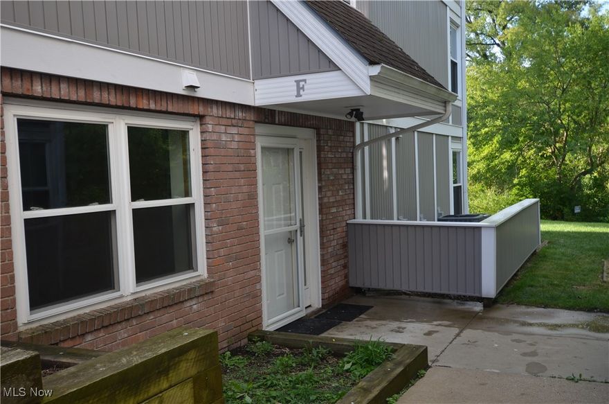 Why rent when you can own on the water? Enjoy all the benefits of property ownership without the worries of exterior maintenance in this first floor condo in Snug Harbor. Discover the perfect blend of comfort and convenience in this delightful waterfront condo nestled in the heart of the Portage Lakes. This spacious 2 bed, 2 bath, first floor unit offers stunning views of Long Lake in the picturesque Portage Lakes. Look at the other units for sale in the development and you will see the potential in this unit. Whether you are looking for waterfront living, to be near the city, or for a waterfront rental, the opportunity is before you. Step inside to find an inviting open floor plan with abundant natural light. The living area features large windows that frame relaxing water views, while the cozy fireplace adds warmth and charm. The well-appointed kitchen boasts modern appliances, ample cabinet space, and a breakfast bar, making it ideal for both entertaining and everyday living. The primary bedroom is a spacious retreat with an en-suite full bath. The 2nd bedroom can serve as a guest room or home office. The back porch and patio are wonderful additions for relaxing as you choose.  Enjoy the best of outdoor living with direct access to the water, where you can boat, fish, or simply unwind by the shore. The community offers additional amenities such as a private dock, picnic shelter, and green spaces.  All the features of a lakeside ranch, but with the advantages of condo living. Recent updates include: New paint throughout (including cabinets), all new lighting, new carpet in beds, re-screened and painted back porch, new outlets, switches, and cover plates. Conveniently located near shopping, dining, and major highways, this condo is an ideal choice for those seeking a peaceful lakeside lifestyle without sacrificing proximity to urban amenities. Don’t miss the opportunity to own this exceptional property? Schedule your private showing today!