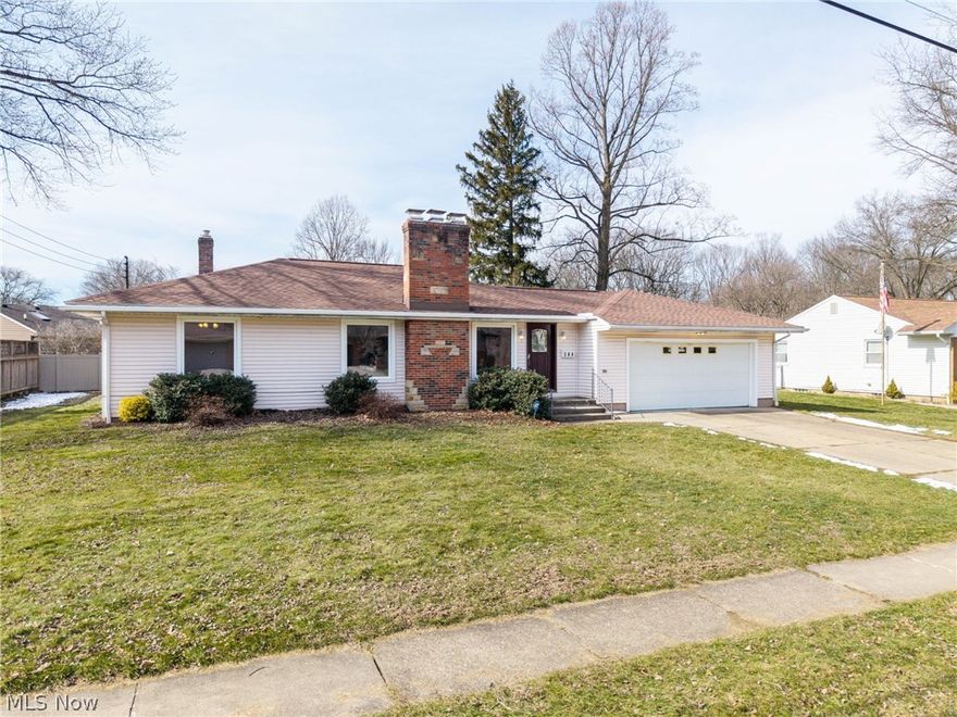 Welcome to this spacious, three-bedroom, two-full bath ranch home perfectly situated on an exceptional lot in a highly convenient location. Enjoy the ease of being just moments away from shopping, dining, and the beautiful Sand Run Metro Park – the ideal blend of suburban tranquility and everyday convenience. Step inside to an expansive living room bathed in natural light, featuring a brick wood-burning fireplace and plenty of room for gathering with family and friends. You’ll immediately appreciate the beautiful, professionally restored hardwood floors throughout and the entire main level freshly painted, creating a bright, move-in-ready feel.
The kitchen and main-level full bathroom feature new flooring, along with many other thoughtful updates throughout the home. The spaces are clean, functional, and offer a fantastic opportunity to add your personal touches while enjoying improvements already completed.  Downstairs, prepare to be impressed by the enormous 47x13 recreation room – the ultimate entertaining space! Complete with a second cozy fireplace, beautiful built-in bar with a wet bar, custom bookcases and shelving, plus built-in benches with hidden storage underneath, this lower level feels like its own private retreat. A second full bathroom, dedicated laundry area with utility sink, and abundant extra storage in the unfinished portion round out the basement perfectly. Outside, the backyard offers complete privacy thanks to fencing on all sides provided by neighboring properties – your own secluded oasis ready for summer barbecues, gardening, or simply relaxing in peace.  With a two-car attached heated garage, tons of living space, numerous updates, and endless potential throughout, this home is waiting for its next owner to make it shine. Don’t miss this rare find – schedule your private showing today and come see everything this wonderful ranch has to offer!