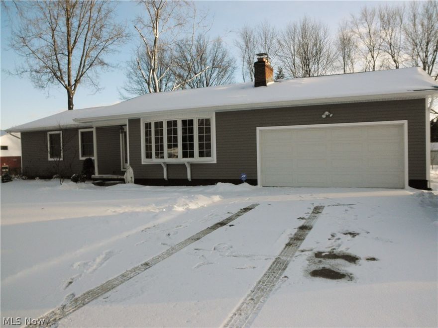 Rare opportunity!  Spectacular 4 bedroom, 2 full bath completely updated ranch in Green Schools.  Roomy foyer with ceramic tile welcomes you to this home.  Spacious great room with bay window and wood burning, floor to ceiling brick fireplace with gas starter option. Renovated kitchen w/ Kraftmaid Maple cabinetry, granite countertops, breakfast bar, ceramic backsplash/floors and stainless steel appliances.  Kitchen open to dining room with Pella French doors to rear porch and patio. Vinyl wainscoting ceiling in kitchen and dining rooms with recessed lighting and updated fixtures.  Hardwood floors throughout great room, dining, hallway and bedrooms.  Roomy master suite with brand new spa-like master bath with ceramic walk-in shower, ceramic floors, new vanity and glass tile backsplash. Three additional bedrooms with hardwood floors. Updated main bath with ceramic floors and shower, and two tiered vanity. Full basement under entire home ready to be finished.  Spacious backyard with play/