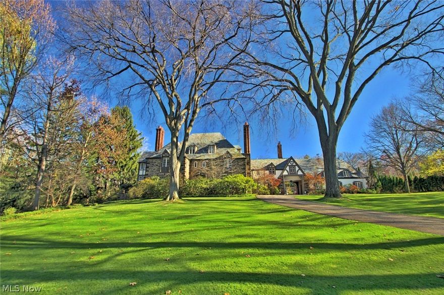 MAGNIFICENT 1920s French Normandy style home situated on one of Shaker’s utmost breathtaking grounds! Exquisite well-preserved detailing throughout including leaded pane windows, multiple stone fireplaces, lavishly restored oak paneling, moldings, and wood floors. Impressive and spacious kitchen fully equipped for a true chef that features a 6-burner Viking gas stove with griddle, Subzero fridge and freezer, dual Bosch dishwashers, Dacor warming drawer, granite counters, custom cherry cabinetry, and radiant heated slate floors. Formal living room, banquet-sized dining room, and elegant library are featured on the first floor. Overlooking the private backyard are the breakfast room and custom enclosed sun room.  This home exudes charm both inside and out!  Gracious setting with lush grounds, pond with waterfall, stone steps, and a beautiful patio- a fairy-tale come true! Updated and finished to perfection! Top location across from Hathaway Brown School.  Shaker Heights is one of the mos