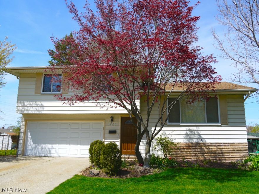 New List this Spring ... Fenced Double lot in Brook Park!  Updated Split level with attached garage, 3 BR, 1.5 Baths with spectacular kitchen opens to a professional 3 Season Raised and Vaulted Florida Room.  The Florida Room, with screens and glass has raised deck and second lower deck.  This is an entertainment paradise.  A revamped above ground pool adds to the fun.  Make your appointment, the home is ready for the next owner.  We can transfer as fast as you can bring in lending or cash. FHA welcomed.  We don't want someone missing the coming summer season in this home.  1 year Warranty.