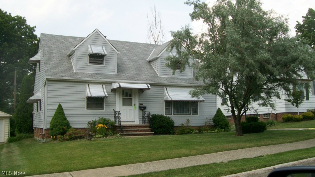 Beautifully restored Cape Cod on a quiet South Euclid street. Large addition in rear w/ fireplace. Hurry, it won't last!